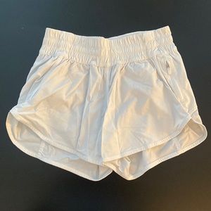 White Lululemon athletic shorts
